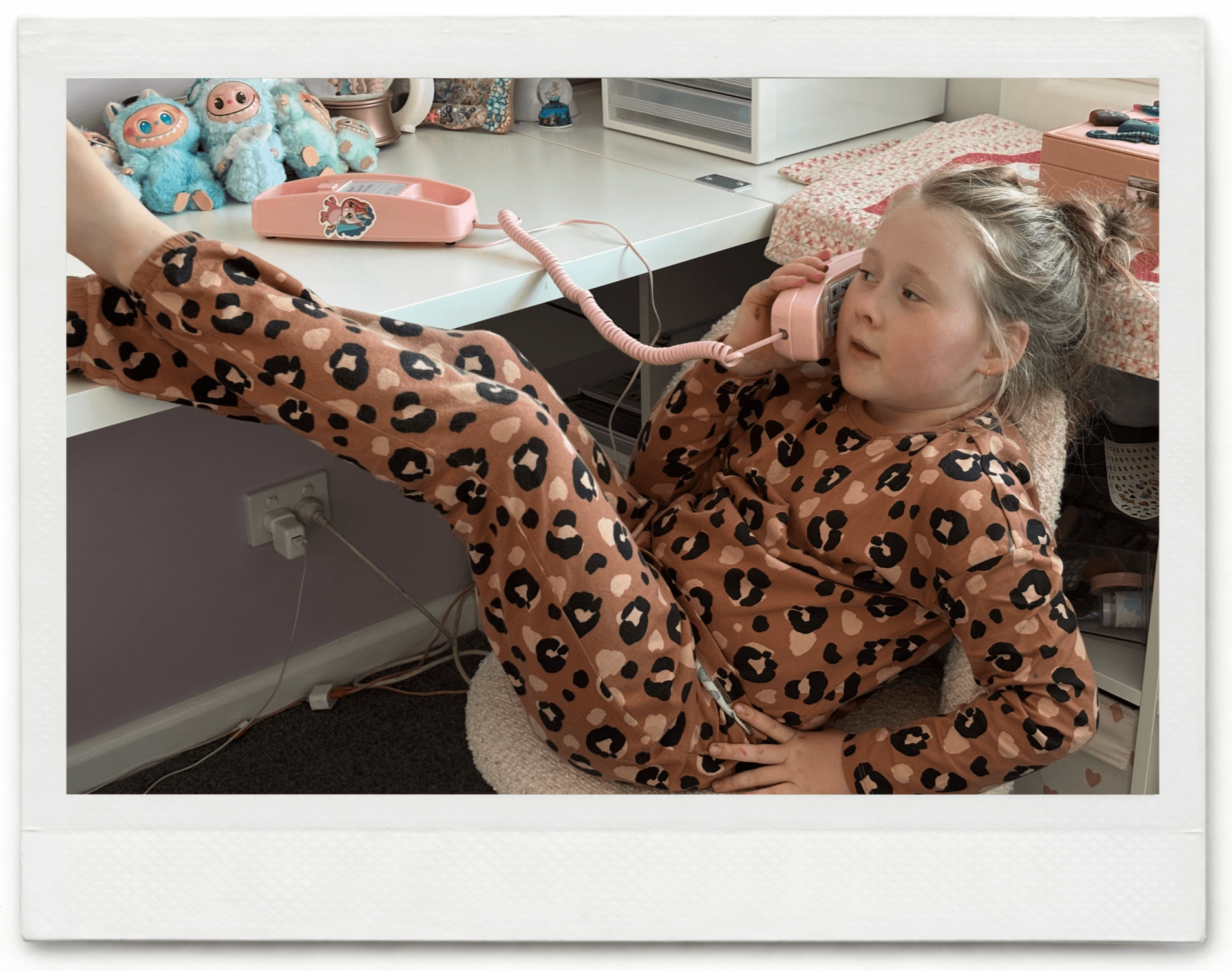 Child talking on a Yarnie phone